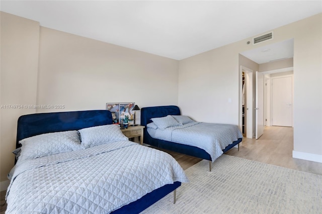 2000 Island Blvd Unit 3010, Aventura, FL 33160 - bedroom featuring light wood-style floors and baseboards