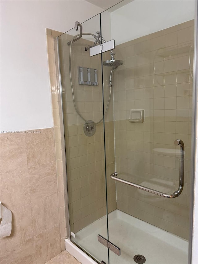 bathroom with a stall shower