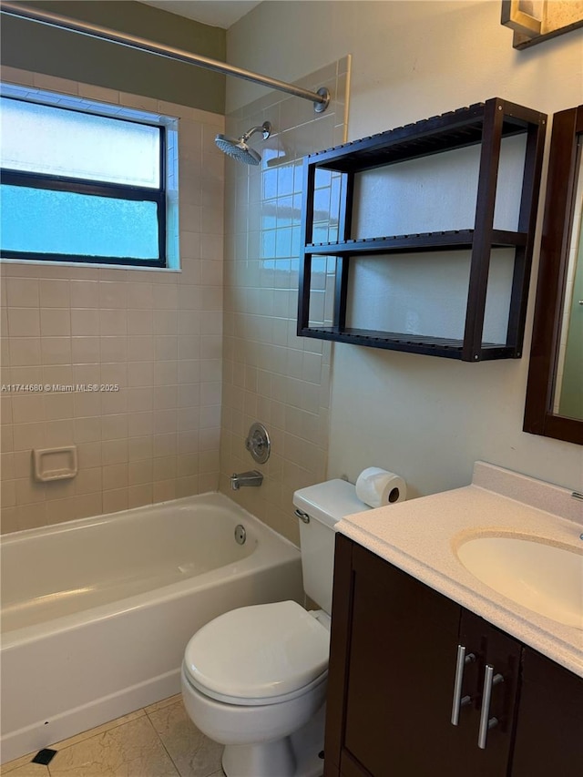 full bath featuring toilet, vanity, tile patterned flooring, and bathing tub / shower combination