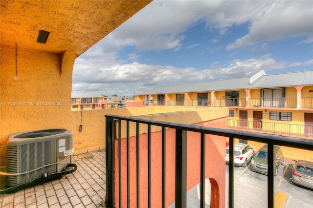 balcony featuring central air condition unit