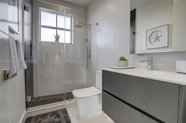 bathroom with toilet, a stall shower, decorative backsplash, and vanity