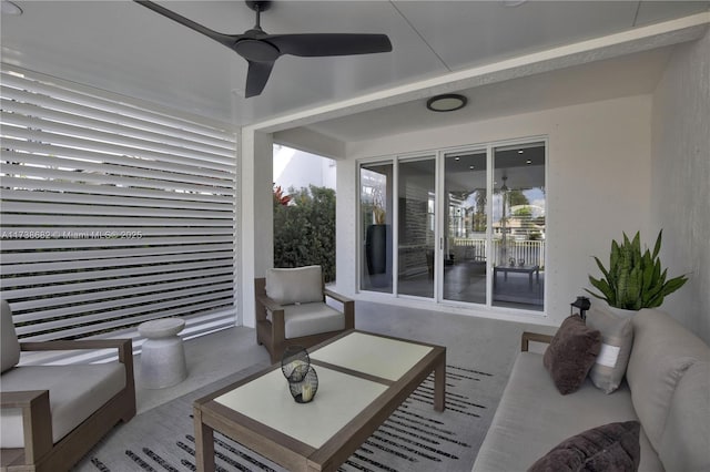 view of patio / terrace with ceiling fan and an outdoor living space