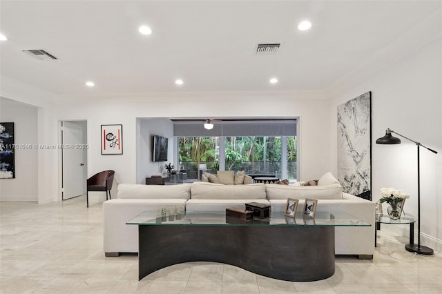 living room featuring ornamental molding, recessed lighting, and visible vents