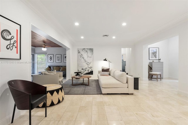 living room featuring ornamental molding, recessed lighting, visible vents, and baseboards