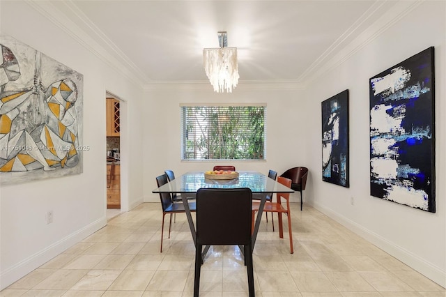 dining room with an inviting chandelier, crown molding, and light tile patterned flooring