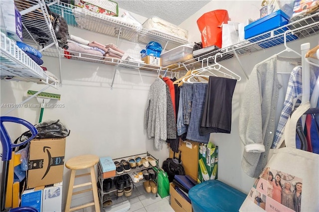 walk in closet featuring tile patterned floors