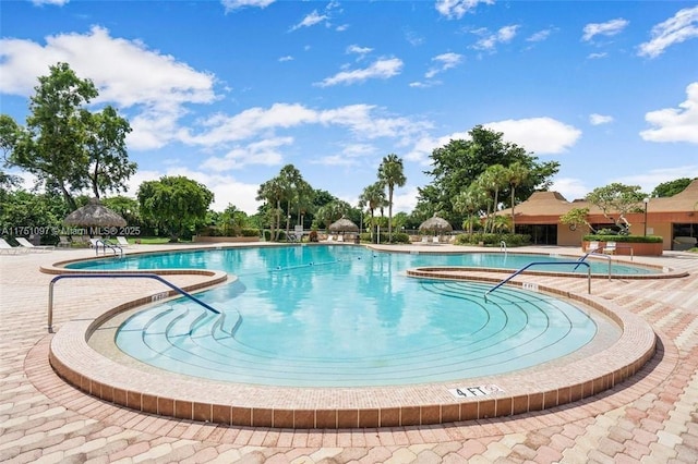 community pool with a patio