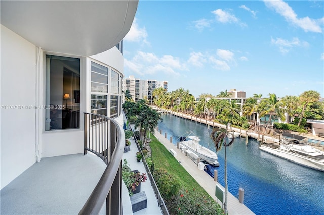 balcony featuring a water view