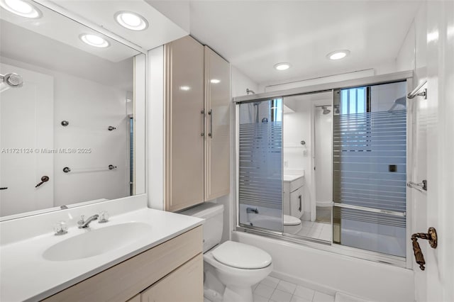 bathroom with bath / shower combo with glass door, toilet, tile patterned floors, vanity, and recessed lighting