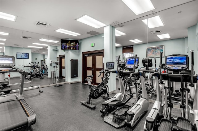 workout area featuring visible vents