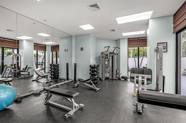 workout area with visible vents and a wealth of natural light