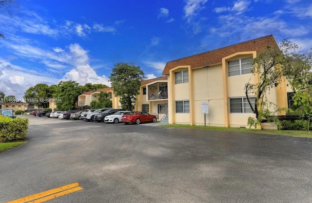 view of uncovered parking lot