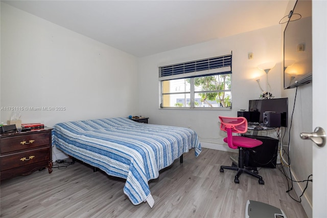 bedroom featuring light wood-type flooring