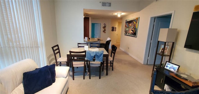1945 S Ocean Dr Unit 701, Hallandale Beach, FL 33009 - dining room featuring light carpet, baseboards, and visible vents
