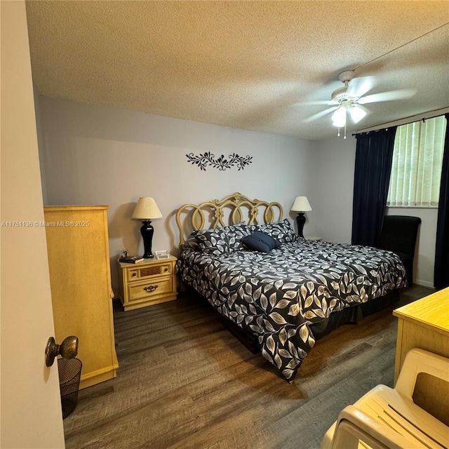 9200 Lime Bay Blvd Unit 212, Tamarac, FL 33321 - bedroom featuring a ceiling fan, wood finished floors, and a textured ceiling