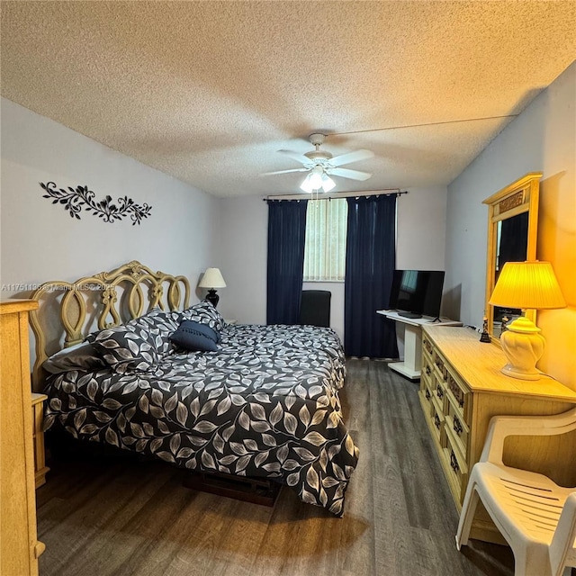 9200 Lime Bay Blvd Unit 212, Tamarac, FL 33321 - bedroom with wood finished floors, a textured ceiling, and a ceiling fan