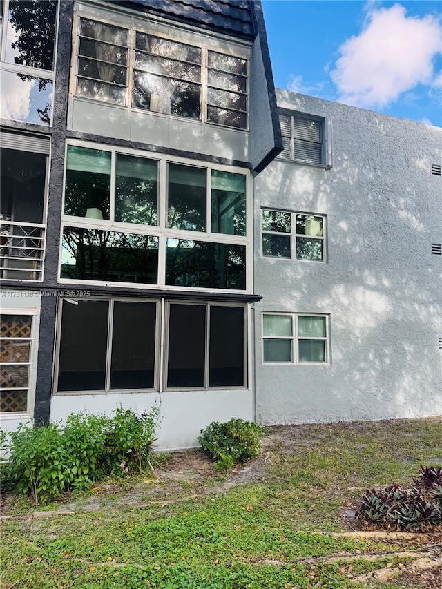 9200 Lime Bay Blvd Unit 212, Tamarac, FL 33321 - view of side of property with stucco siding