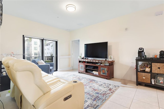 living room with light tile patterned floors