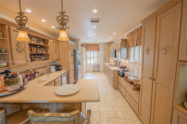 1111 Washington St, Hollywood, FL 33019 - kitchen featuring open shelves, a breakfast bar, a peninsula, light countertops, and pendant lighting