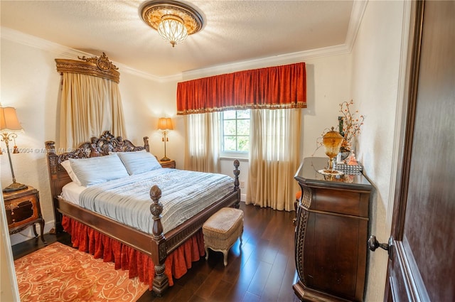 1111 Washington St, Hollywood, FL 33019 - bedroom featuring a textured ceiling, ornamental molding, and dark wood-type flooring
