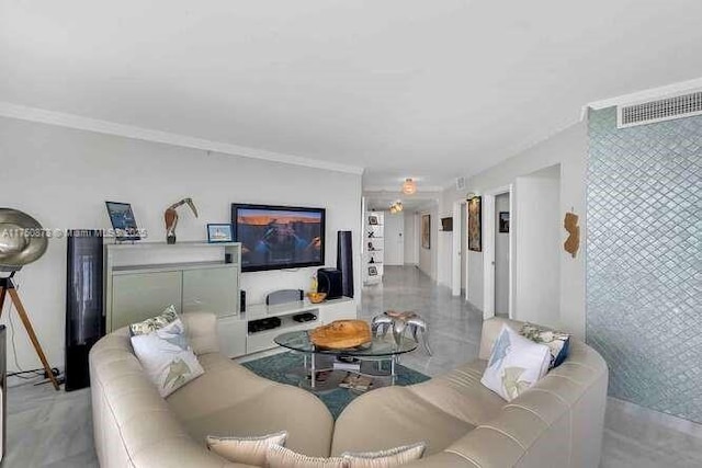 living room with visible vents and crown molding