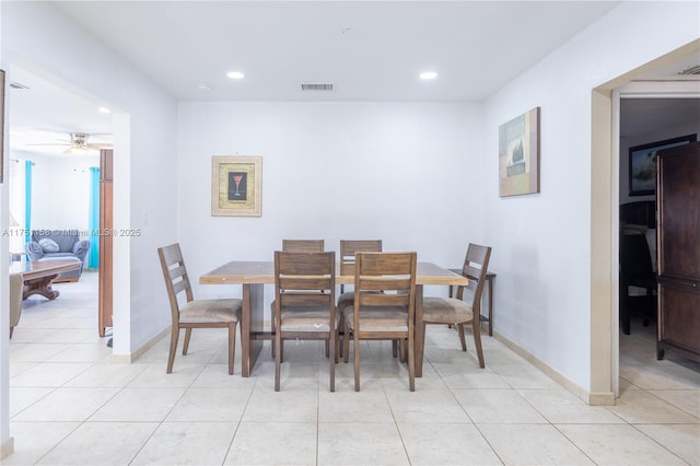 dining area featuring light tile patterned floors, baseboards, visible vents, and recessed lighting