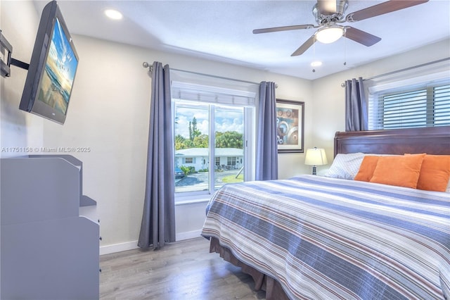 bedroom with access to exterior, recessed lighting, a ceiling fan, wood finished floors, and baseboards