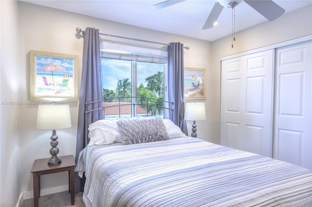 bedroom with ceiling fan, baseboards, and a closet