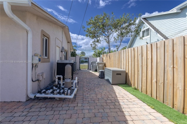 view of patio featuring fence