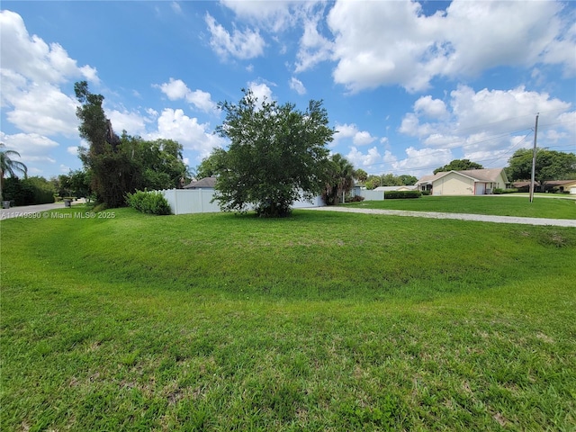 view of yard featuring fence