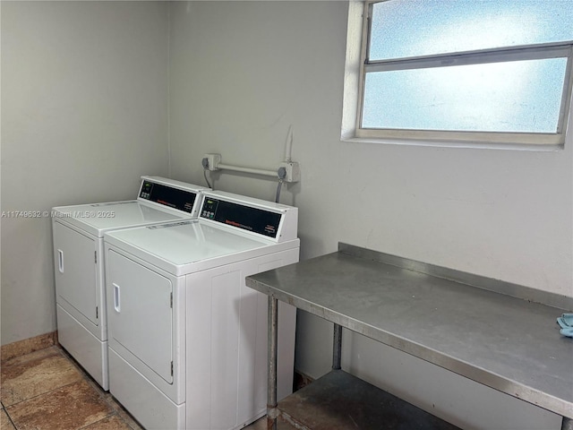 common laundry area with independent washer and dryer