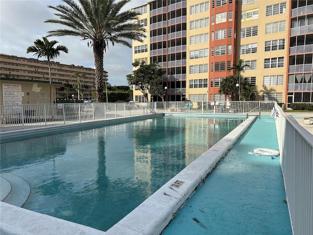 pool featuring fence