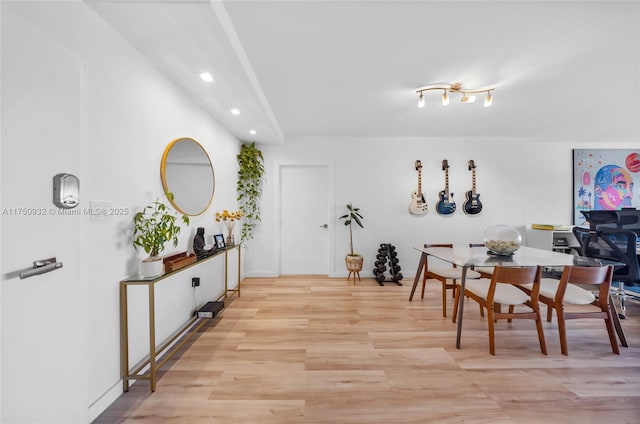 dining space featuring recessed lighting and light wood-style floors