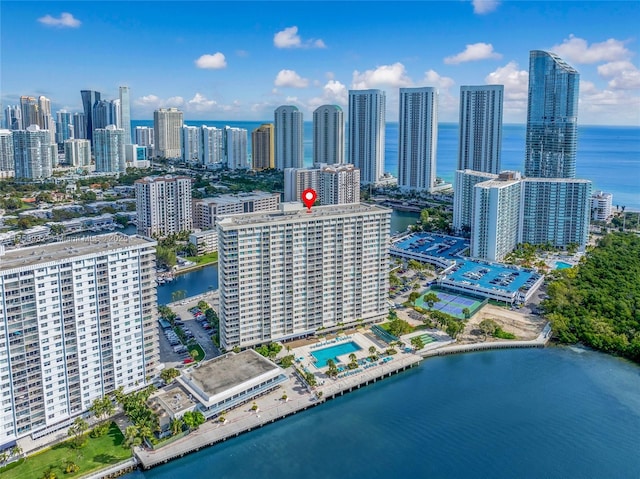 aerial view featuring a water view and a view of city