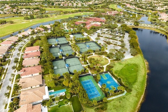 birds eye view of property with a water view and a residential view