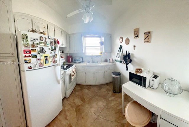 kitchen with white appliances, white cabinetry, light countertops, and a sink