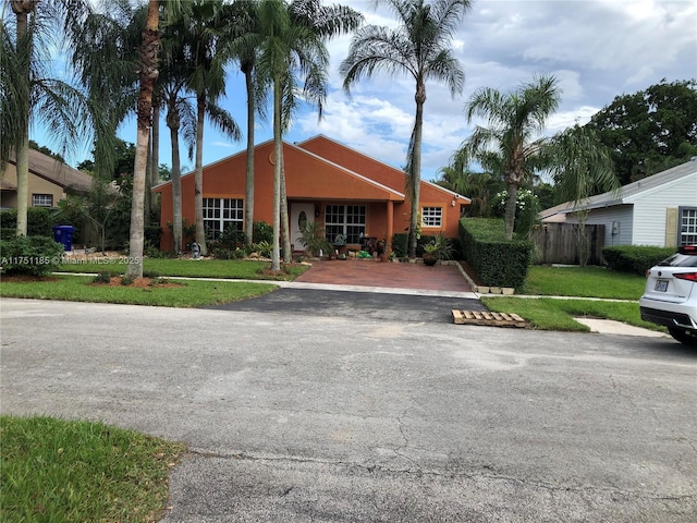 view of property with fence