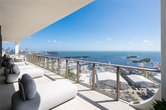 balcony with a view of city and a water view