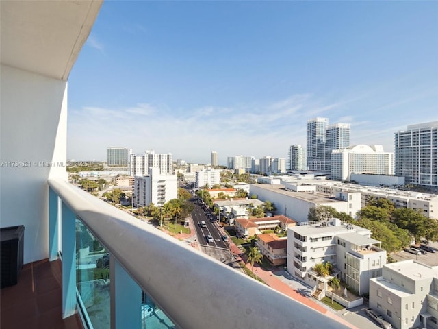 balcony featuring a city view