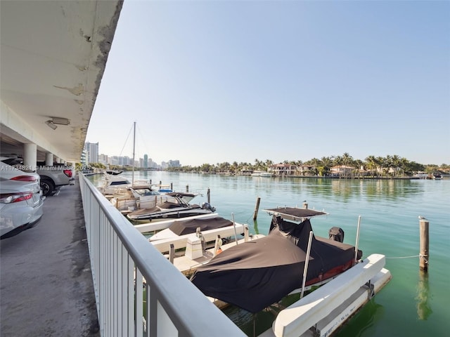 dock area featuring a water view and boat lift