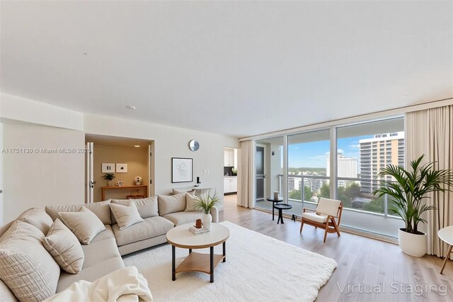 2751 S Ocean Dr Unit 1003N, Hollywood, FL 33019 - living room with floor to ceiling windows and light wood-style floors