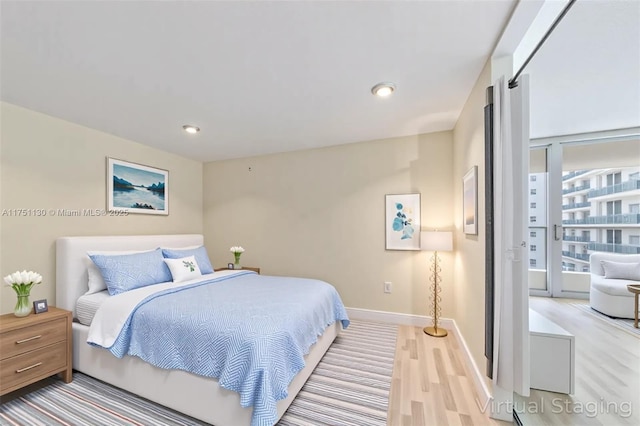 2751 S Ocean Dr Unit 1003N, Hollywood, FL 33019 - bedroom with light wood-style floors, baseboards, and recessed lighting