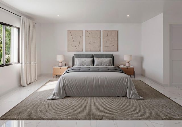 bedroom with recessed lighting, marble finish floor, and baseboards