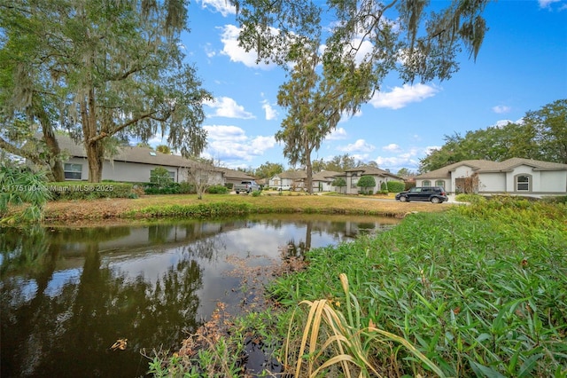 view of water feature with a residential view