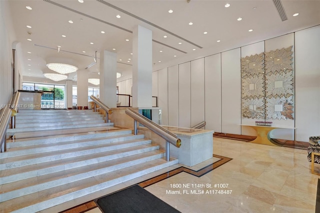 stairs featuring recessed lighting