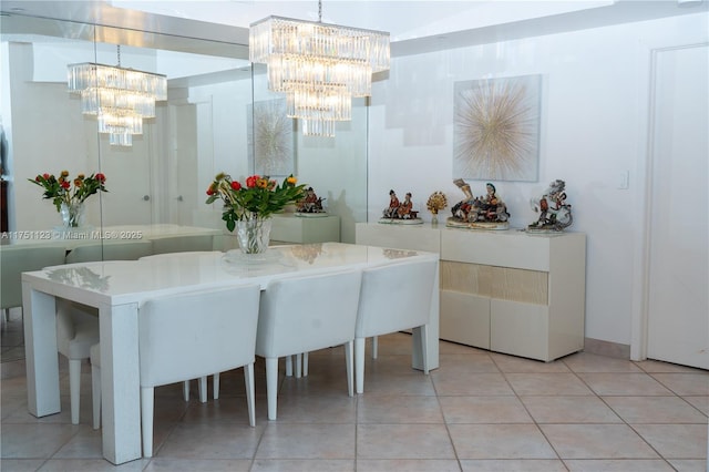 unfurnished dining area featuring a chandelier and light tile patterned flooring