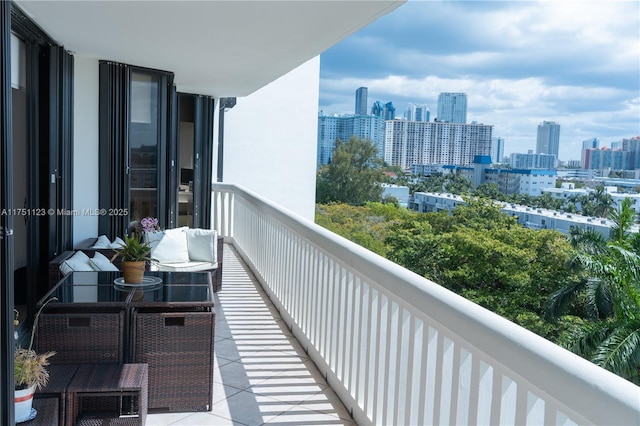 balcony featuring a view of city