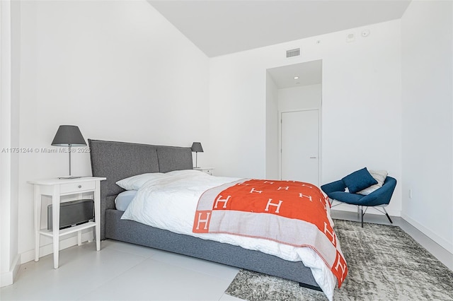 bedroom featuring visible vents and baseboards