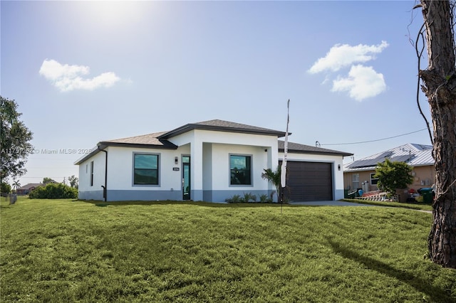 prairie-style home featuring a garage, a front lawn, concrete driveway, and stucco siding