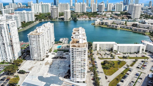 aerial view with a view of city and a water view